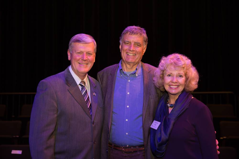 President Haas, and Marcia Haas are posing with Fred Keller.